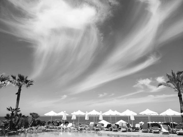 Fading clouds over the pool