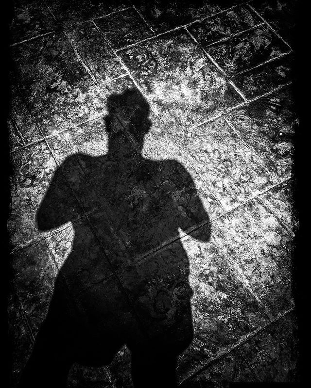 Shadow on paved floor