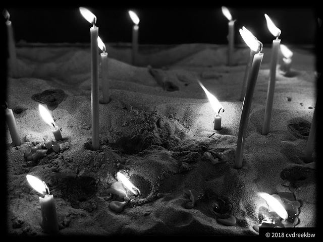 Candles in the sand