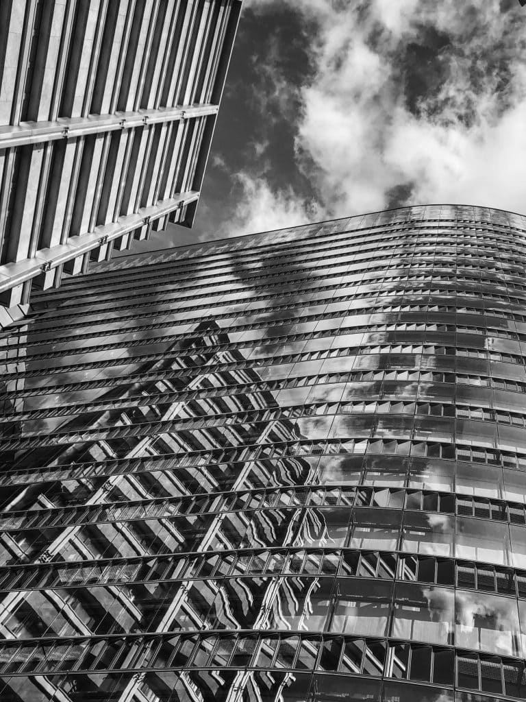 Clouds in a building reflection